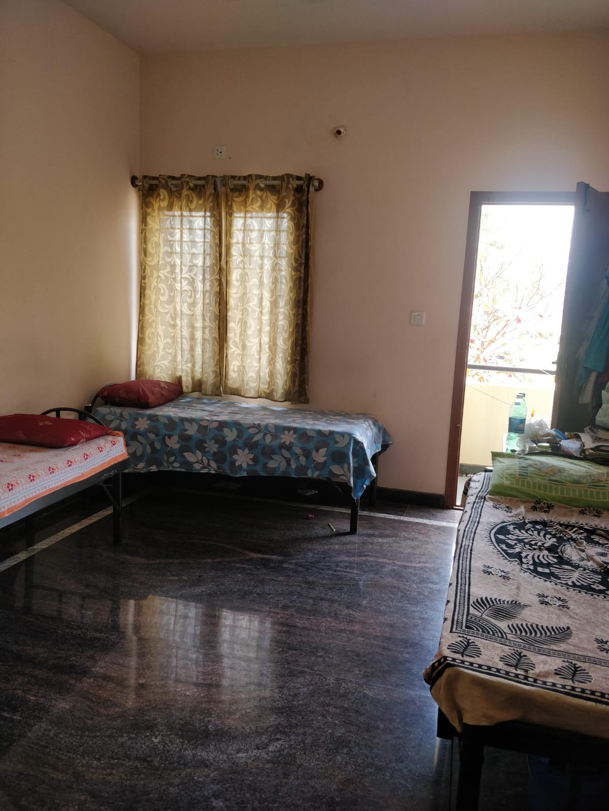 Triple sharing room with balcony access